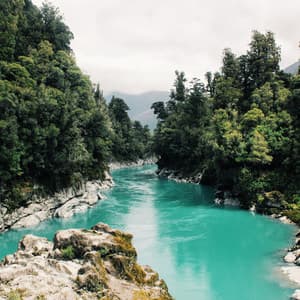 Serene Waters: Reflective River Journey - TELEKROME